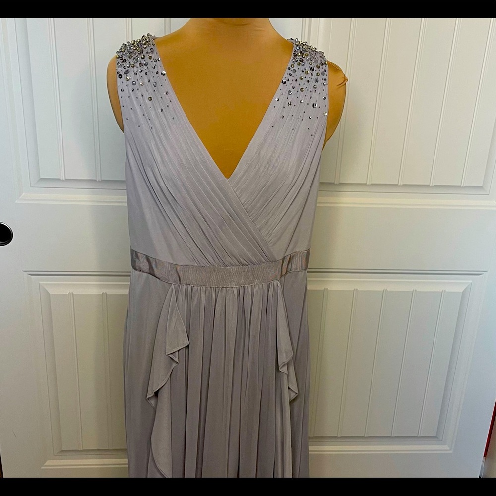 Adrianna Papell Silver V-Neck Tulle Cascade gown.
